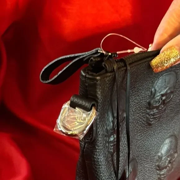 Impeller Black Skull Embossed italian leather crossbody Bag